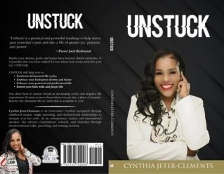 Serene moment of reading by the ocean in Cape Town with shimmering waters.